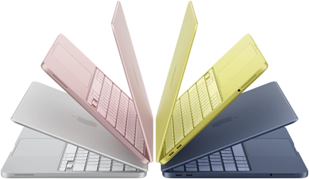 MacBook Neo laptops in silver, blush, citrus, and indigo colors, slightly open and arranged in an arch formation