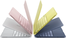 MacBook Neo laptops in silver, blush, citrus, and indigo colors, slightly open and arranged in an arch formation