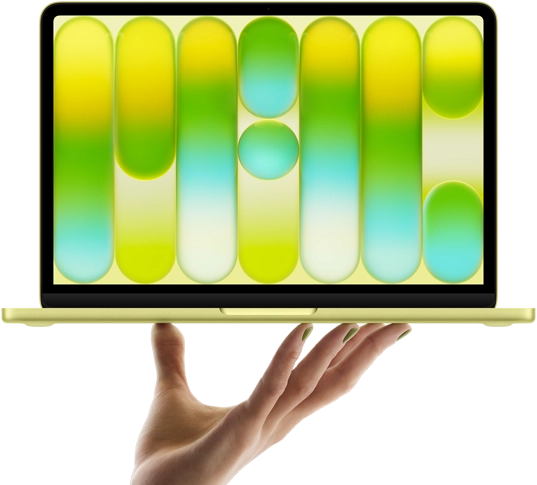 MacBook Neo in citrus color, balanced on fingertips of open hand, screen displaying colorful abstract pattern