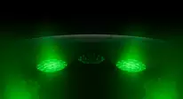 Back of Apple Watch Ultra 4, titanium case, black color, multiple round sensors with glowing green LED lights