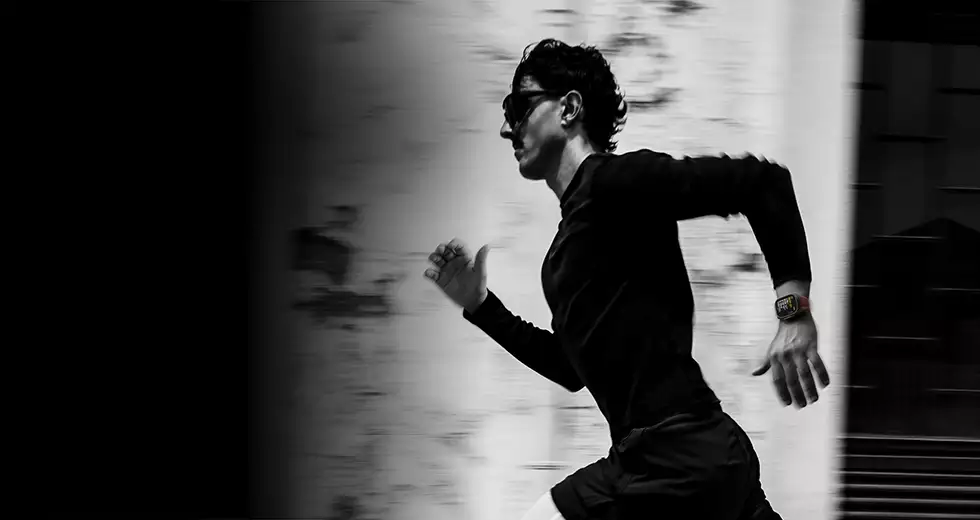 A person running while wearing Apple Watch Ultra 4