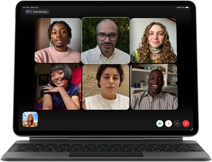 iPad Air, attached to Magic Keyboard, Black color, Group FaceTime call on screen