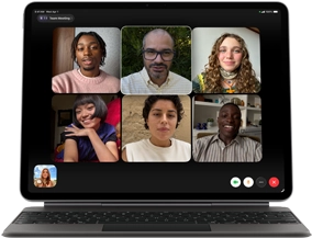 iPad Air, attached to Magic Keyboard, Black color, Group FaceTime call on screen