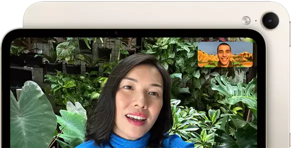iPad mini, front view, displaying a Landscape 12MP Center Stage front camera interface, showing a person video calling amidst green foliage