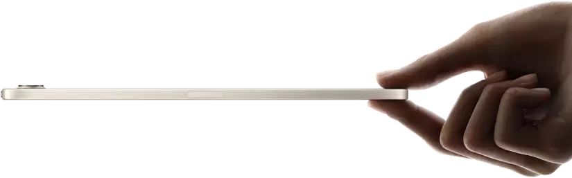 iPad mini, held in hand, side view, thin and lightweight design