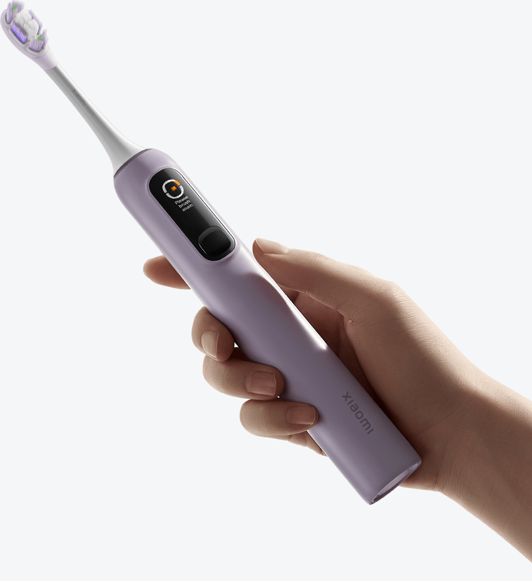 Ръка държи Xiaomi Oscillation Electric Toothbrush Pro с включен цветен дисплей