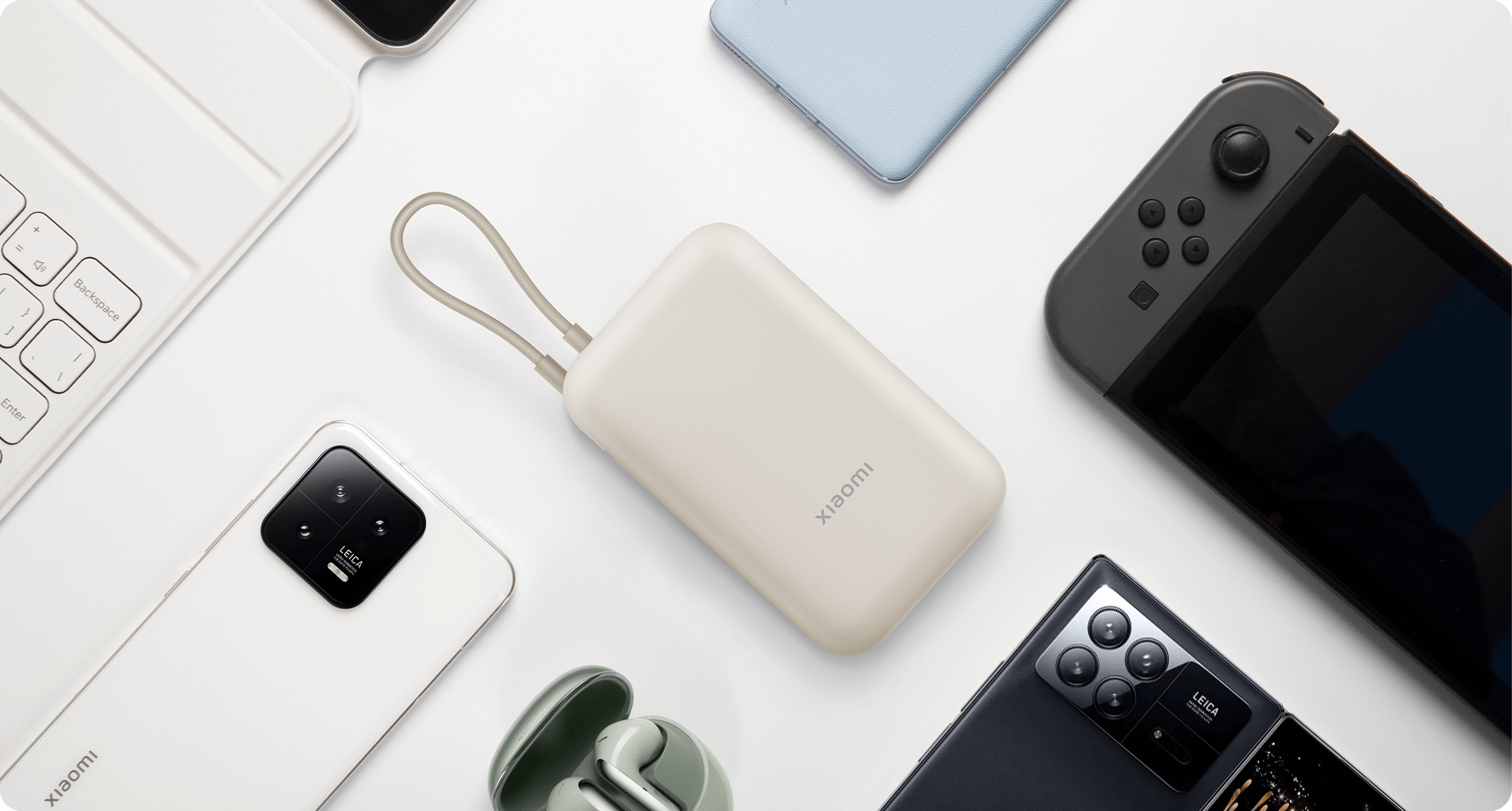 Външна батерия Xiaomi Power Bank 10000mAh (Integrated Cable) с телефони, слушалки и Nintendo Switch