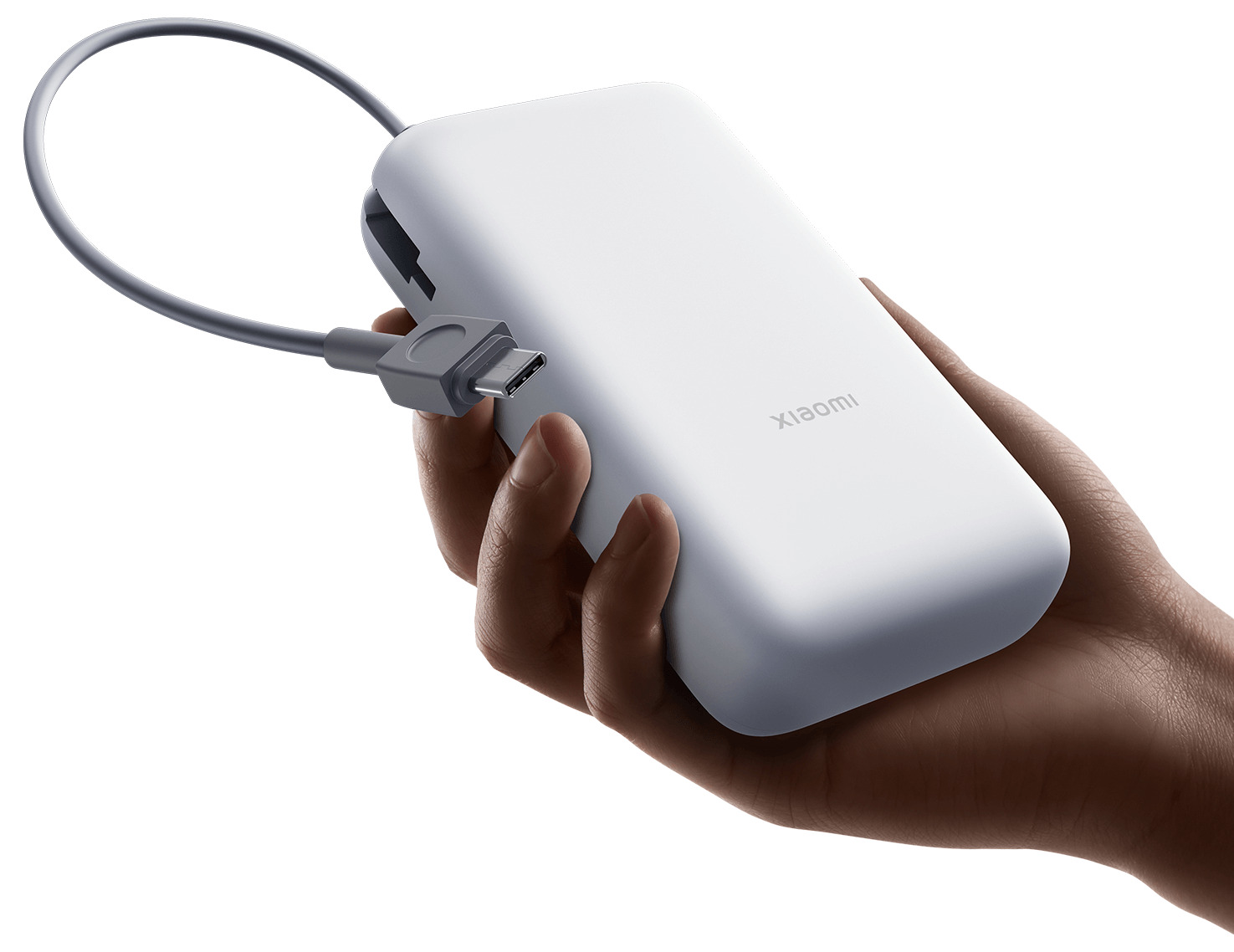 Вграденият USB-C кабел на Xiaomi Power Bank 20000mAh (Integrated Cable), държан в ръка