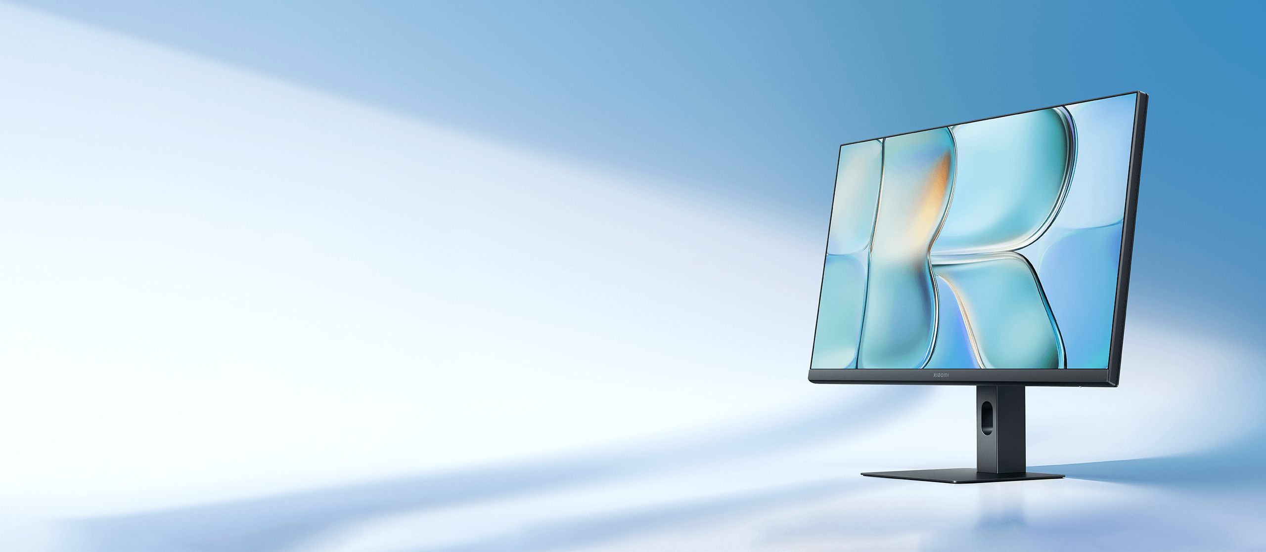Xiaomi Monitor A24i 2026 с тънки рамки, показан от три четвърти