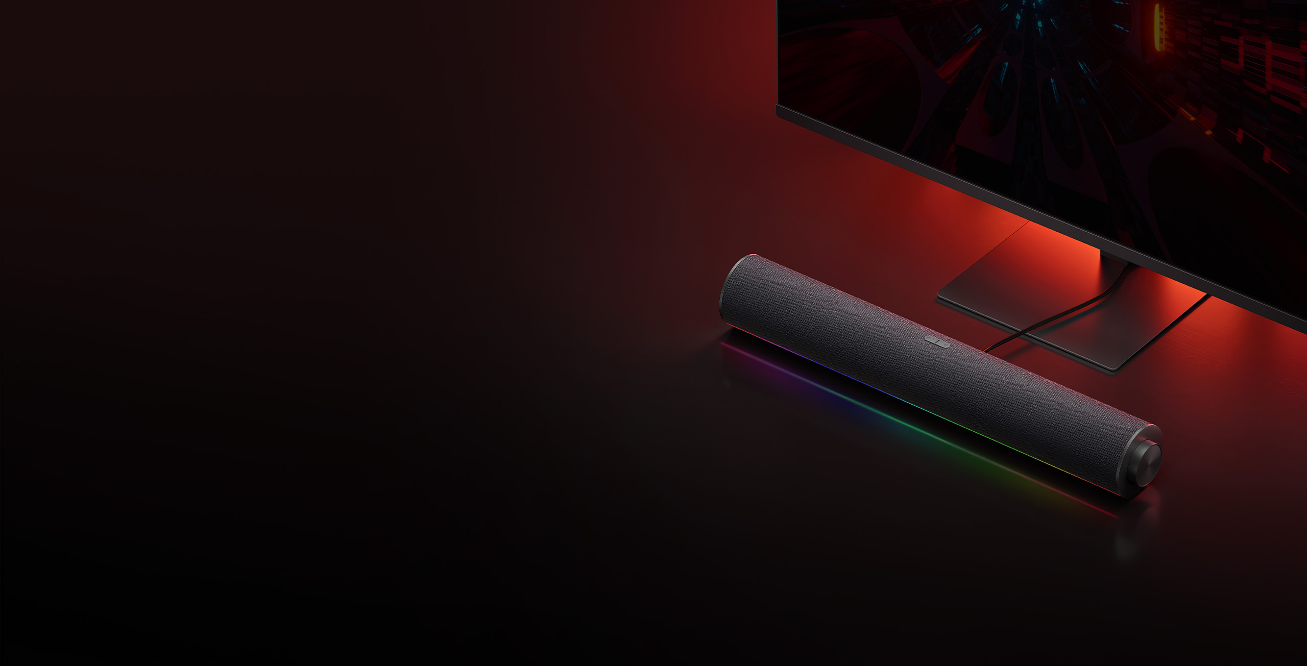 Колона за компютър Xiaomi Desktop Speaker с RGB подсветка на бюро до монитор