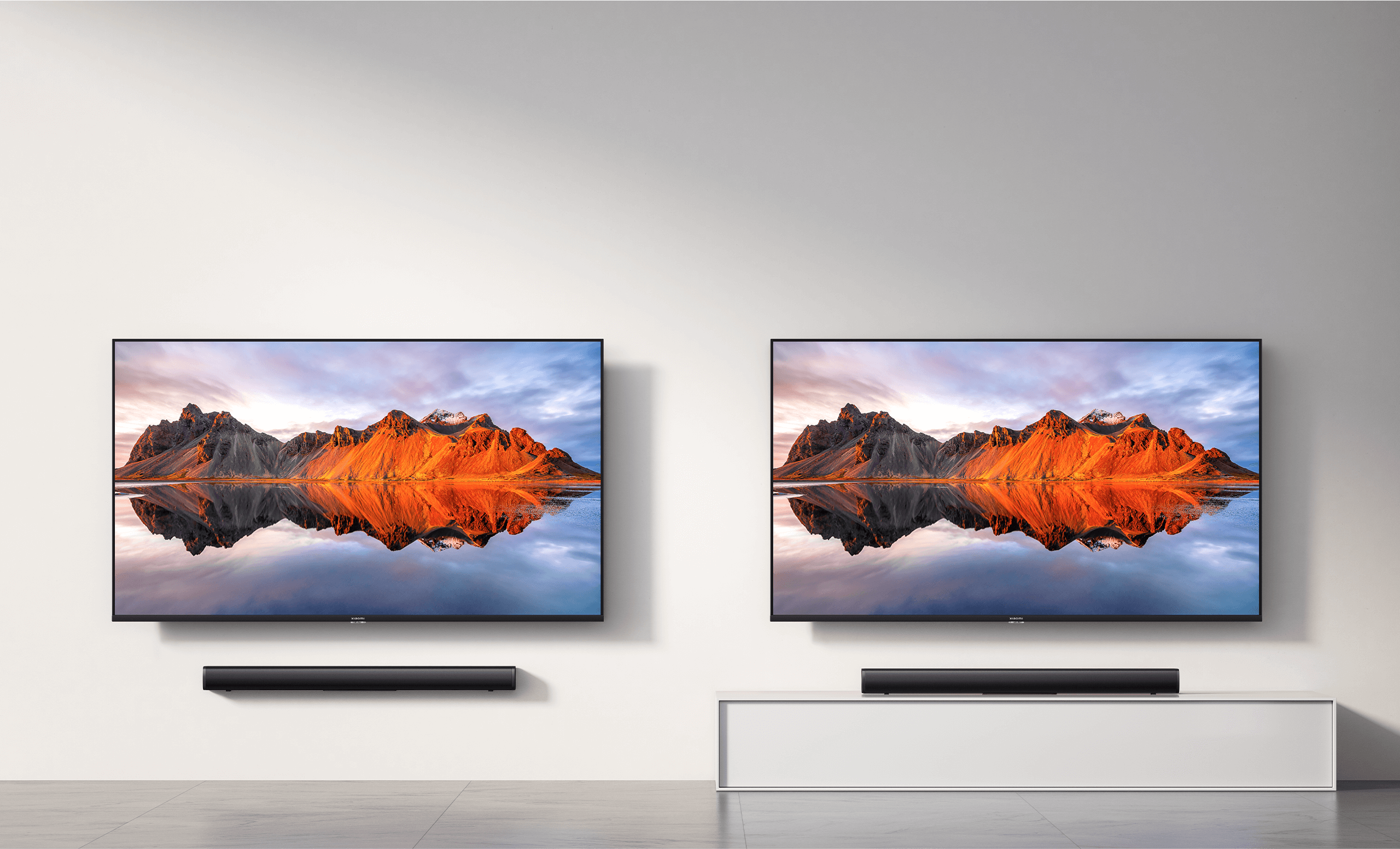 Саундбар Xiaomi Soundbar 2.0ch, монтиран на стена и поставен върху шкаф под телевизор